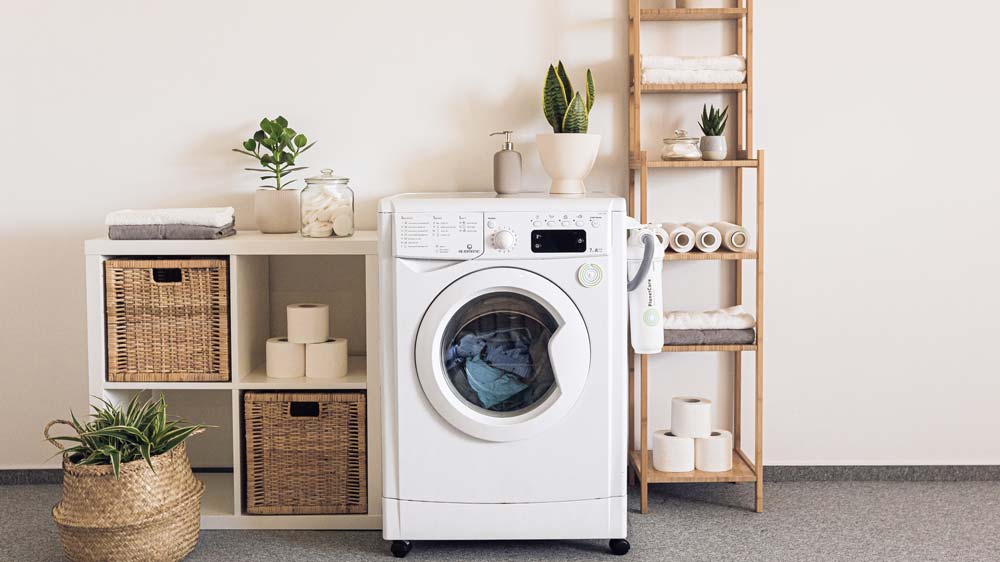 Laundry room with a white washer/dryer